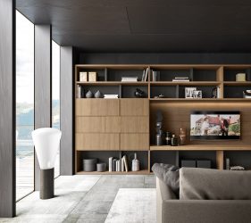 salotto moderno ma rustico con divano e armadio porta tv ampio di colore marrone e nero