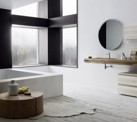 bagno moderno arbi elegante e raffinato con lavandino e armadietti in legno e vasca da bagno quadrata